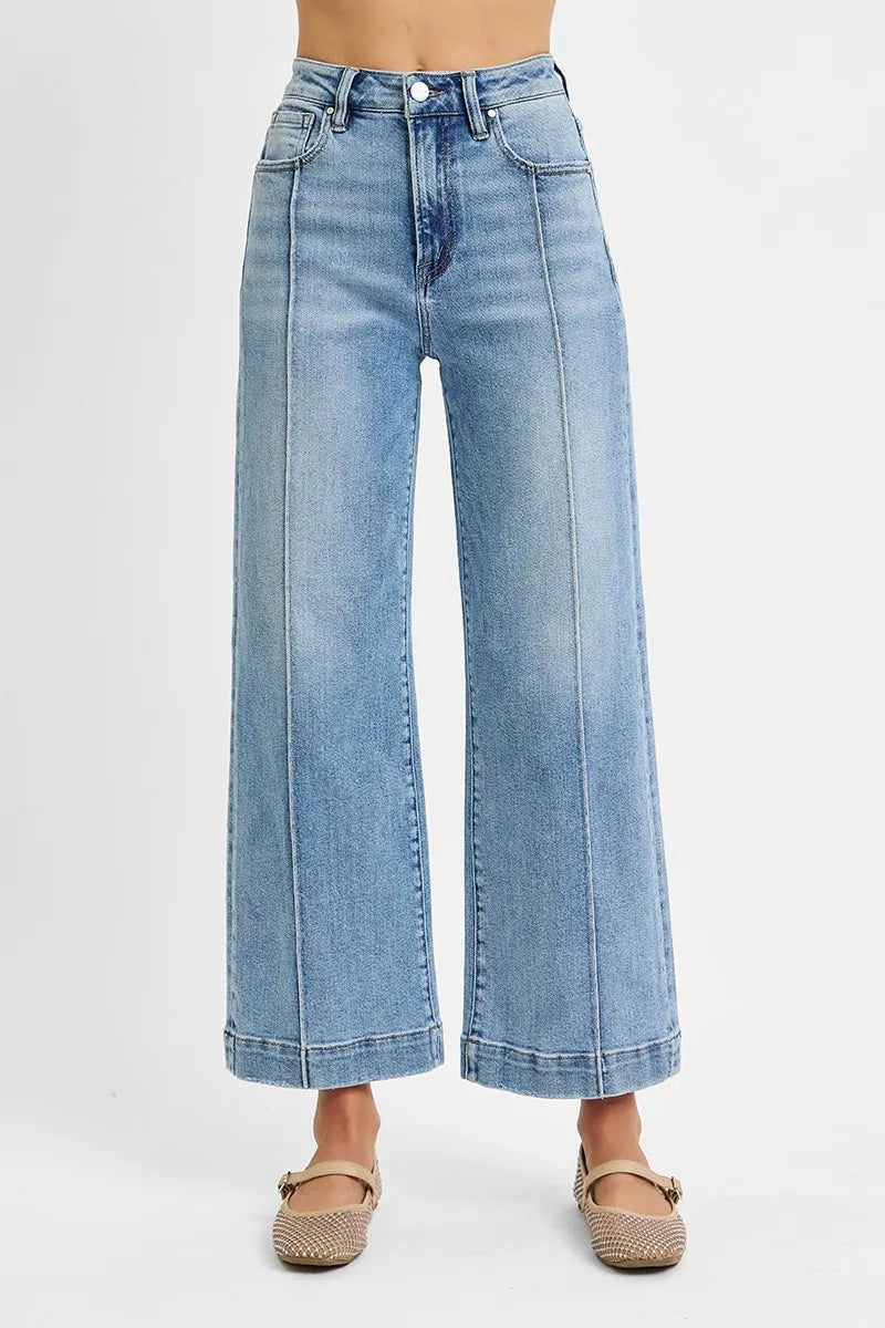 Front view of Risen High Rise Crop Wide Leg Jeans, featuring a flattering high-rise waist and cropped wide-leg fit.
