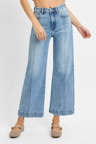 Side profile view of Risen High Rise Crop Wide Leg Jeans, showcasing the cropped length and wide-leg cut.