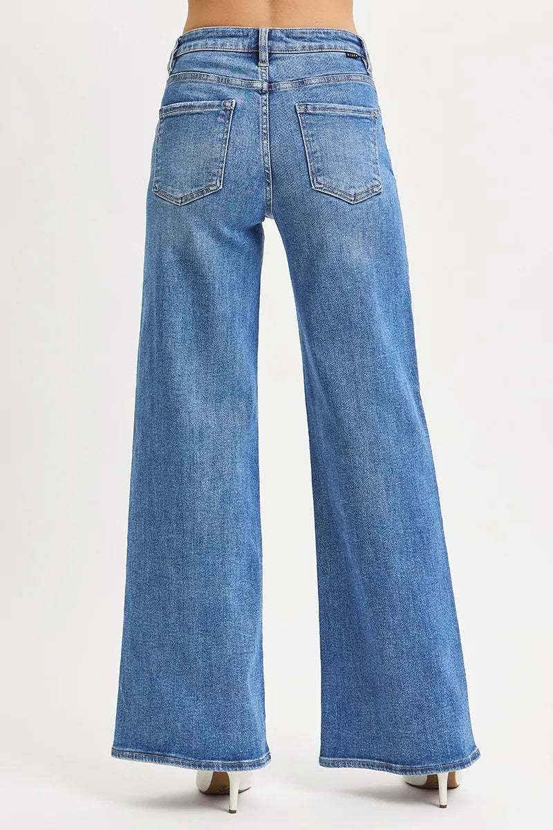 Close-up of the wide-leg hem on Risen Full Size High Rise Wide Leg Jeans, showcasing the stylish flare and clean finish.