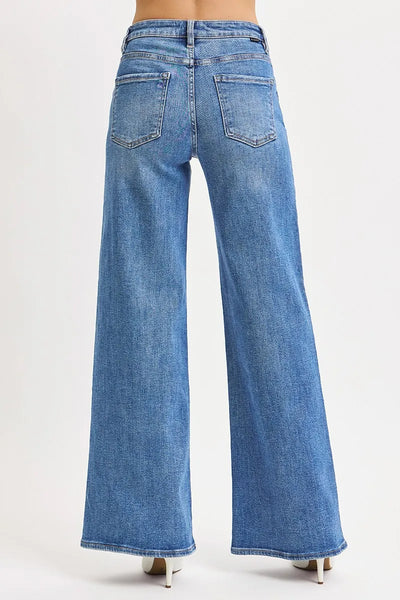 Close-up of the wide-leg hem on Risen Full Size High Rise Wide Leg Jeans, showcasing the stylish flare and clean finish.