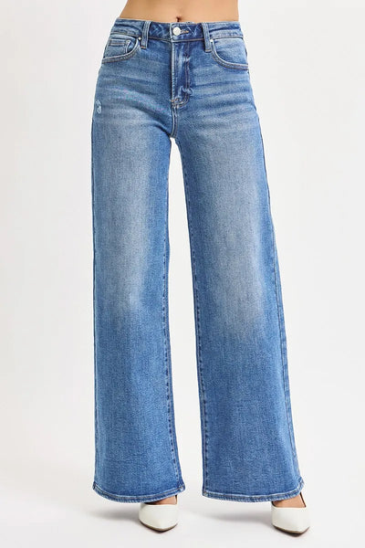 Side view of Risen Full Size High Rise Wide Leg Jeans, showcasing the relaxed fit and full-length wide legs.
