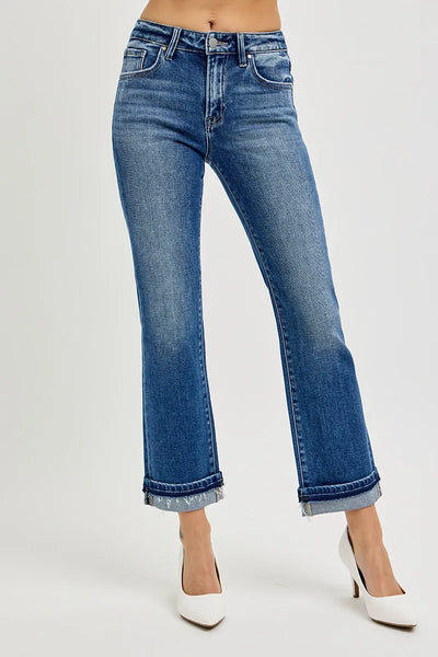 Back view of Risen Mid Rise Ankle Straight Cuffed Jeans, emphasizing the relaxed fit and stylish pocket detailing.