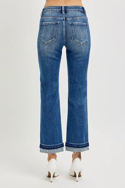 Close-up of the cuffed hem of Risen Mid Rise Ankle Straight Cuffed Jeans, highlighting the casual and trendy finish.
