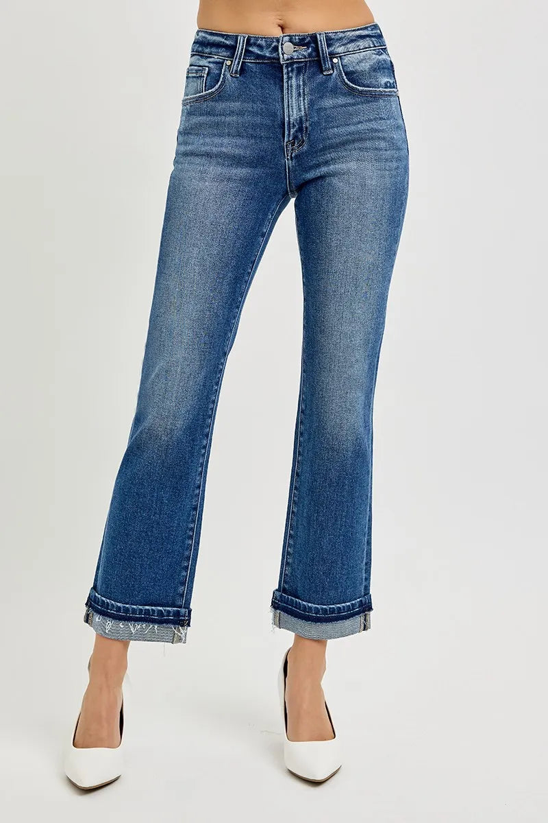 Side view of Risen Mid Rise Ankle Straight Cuffed Jeans, highlighting the straight-leg fit and cuffed hem.
