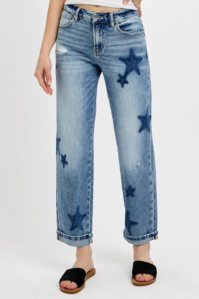 Back view of Risen Full Size Mid Rise Boyfriend Star Shadow Detail Cuffed Jeans, highlighting the comfortable fit and stylish design.