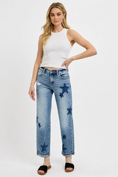 Model wearing Risen Full Size Mid Rise Boyfriend Star Shadow Detail Cuffed Jeans, showcasing the relaxed fit and star shadow detail.