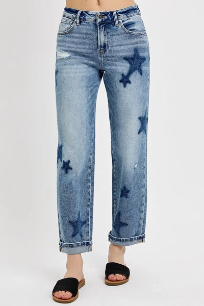 Side view of Risen Full Size Mid Rise Boyfriend Star Shadow Detail Cuffed Jeans, showcasing the relaxed boyfriend fit and cuffed ankle.