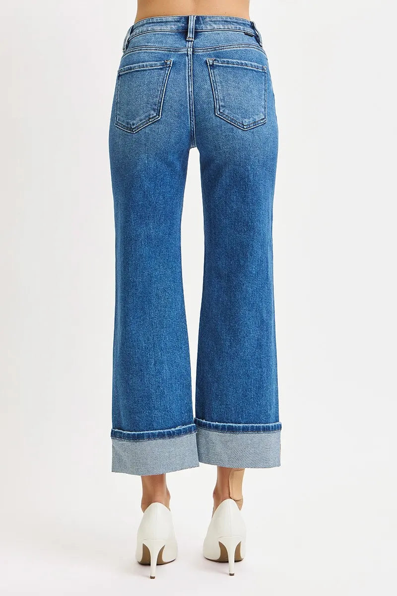 Close-up of the cuffed hem on Risen Full Size Mid Rise Crop Straight Cuffed Jeans, showcasing the cropped and cuffed ankle design.