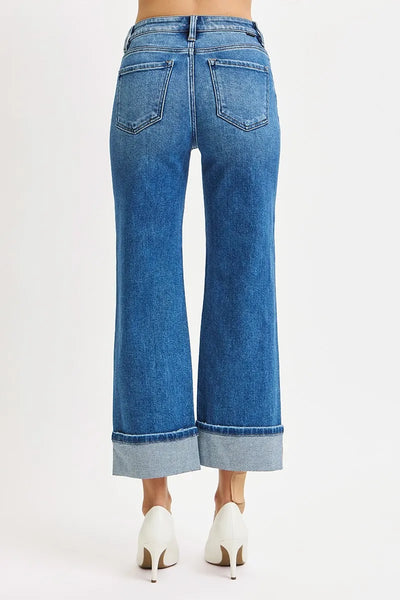 Close-up of the cuffed hem on Risen Full Size Mid Rise Crop Straight Cuffed Jeans, showcasing the cropped and cuffed ankle design.