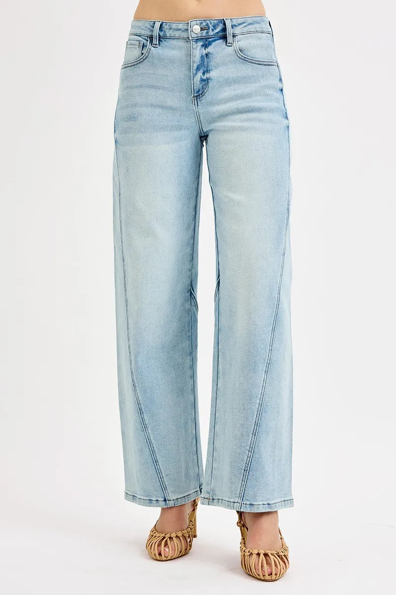 Side view of Risen Full Size Mid Rise Fit Barrel Jeans, showcasing the comfortable fit and barrel-leg silhouette.