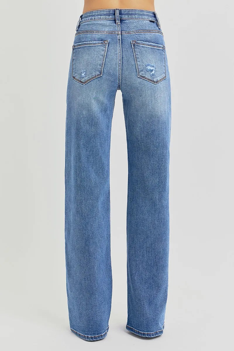 Close-up of the wide-leg hem of Risen Full Size Tummy Control Elastic Band High Rise Wide Jeans, showcasing the relaxed fit.