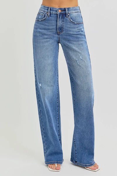 Side view of Risen Full Size Tummy Control Elastic Band High Rise Wide Jeans, showcasing the wide-leg silhouette and comfortable fit.
