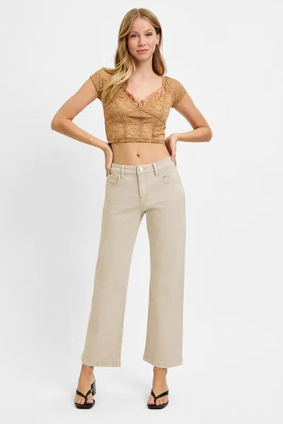 Model wearing Risen Full Size Tummy Control Mid Rise Ankle Straight Jeans, showcasing the flattering fit and ankle-length cut.