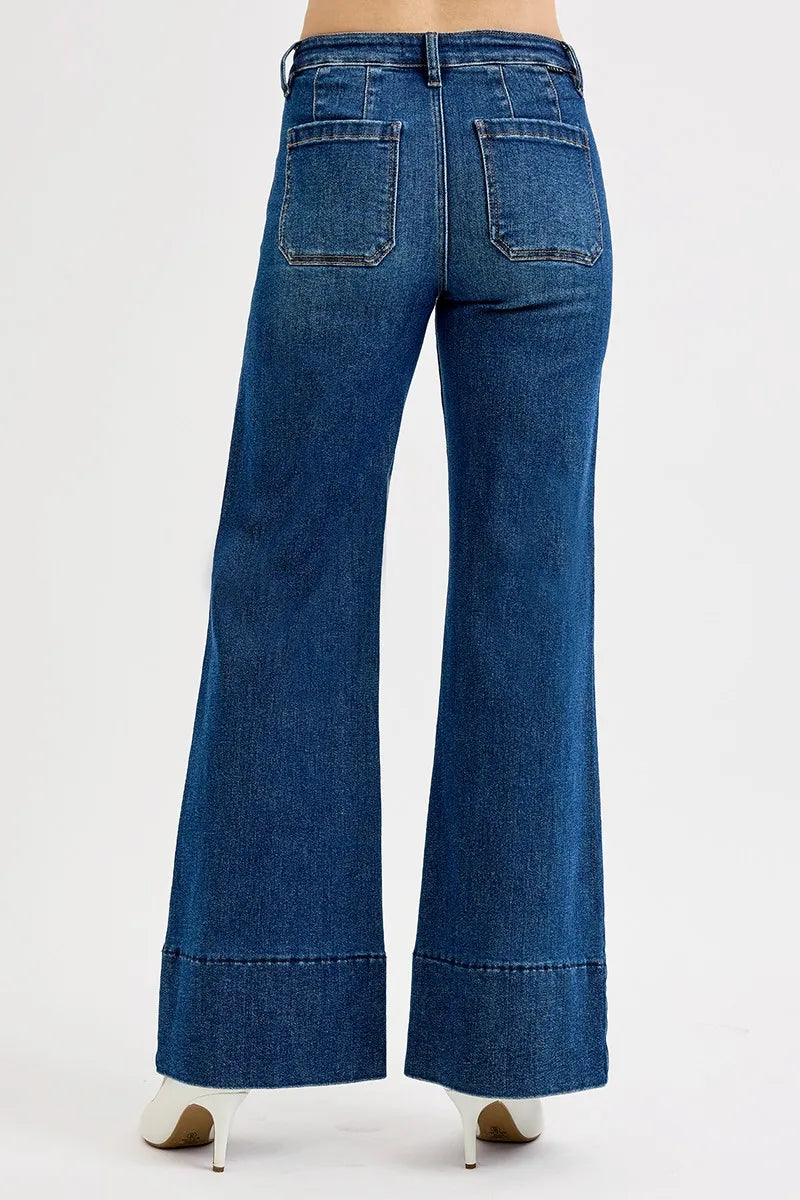 Close-up of the ankle-wide flare hem on Risen Full Size Tummy Control Mid Rise Ankle Wide Flare Jeans, highlighting the stylish flare finish.