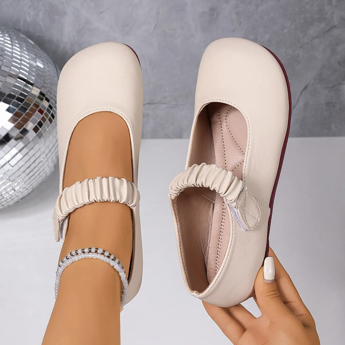 Back view of model wearing Round Toe Flat Loafers, highlighting the slip-on design and easy fit.