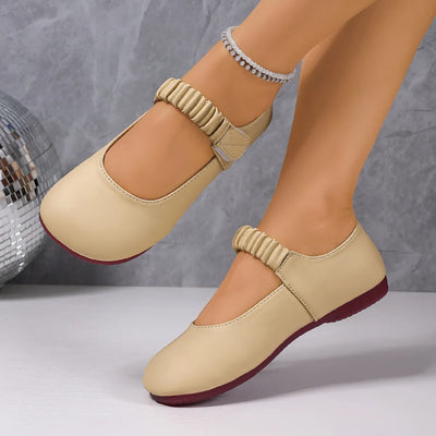 Front view of Round Toe Flat Loafers, showcasing the simple yet elegant round toe and slip-on style.