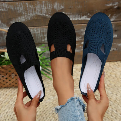 Front view of Round Toe Flat Slip-Ons, featuring a simple slip-on design with a round toe for comfort.