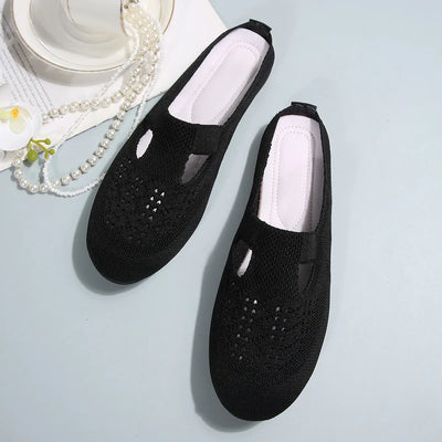 Close-up of the heel of Round Toe Flat Slip-Ons, showcasing the comfortable low-heel design.