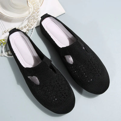 Model wearing Round Toe Flat Slip-Ons, showcasing the casual fit and easy-to-wear design.