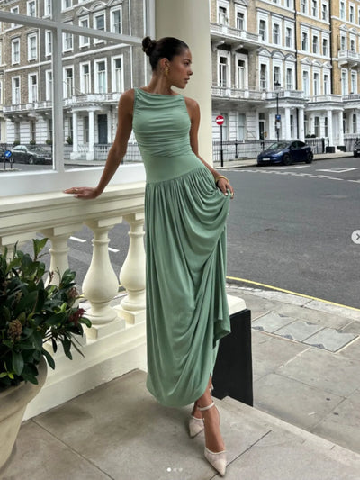 Back view of Ruched Sleeveless Maxi Dress, highlighting the elegant fit and smooth lines.