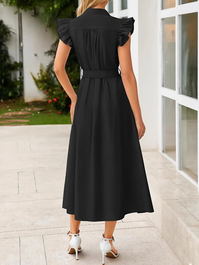 Side view of Ruffled Button Front Midi Dress, showcasing the flowy skirt and fitted waist.