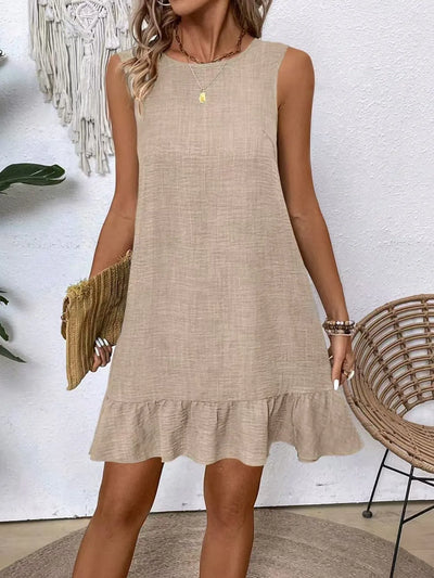 Complete look of Ruffled Hem Round Neck Sleeveless Dress, showing the overall design, relaxed fit, and ruffled hem.