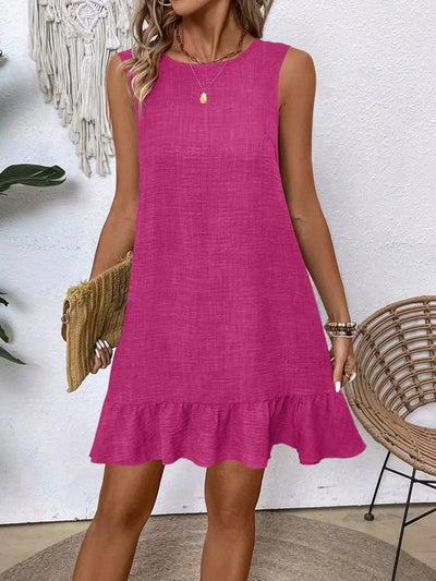 Front view of model wearing Ruffled Hem Round Neck Sleeveless Dress, showcasing the round neckline and ruffled hem.