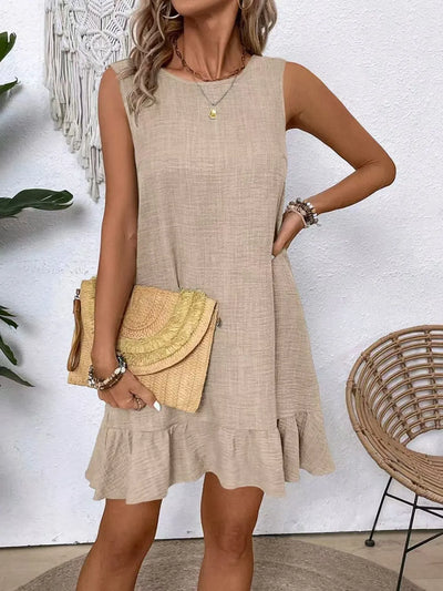 Model wearing Ruffled Hem Round Neck Sleeveless Dress, showcasing the relaxed fit and elegant style.