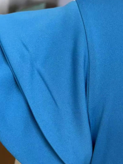 Model wearing Ruffled Layered Short Sleeve Mini Dress in Sky Blue