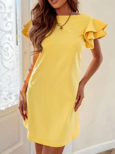Side view showcasing the fit of Ruffled Layered Short Sleeve Mini Dress in Yellow