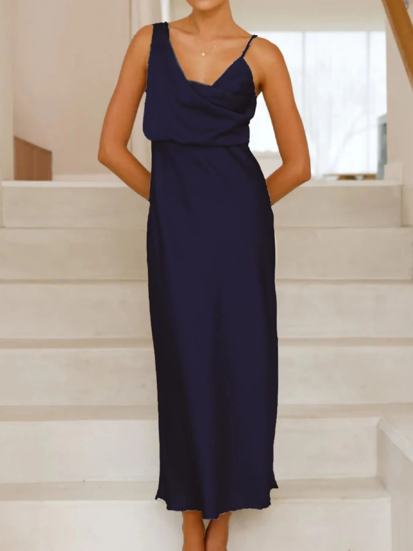 Side view showcasing the fit of Satin Asymmetrical Midi Dress in Dark Blue