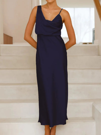 Side view showcasing the fit of Satin Asymmetrical Midi Dress in Dark Blue