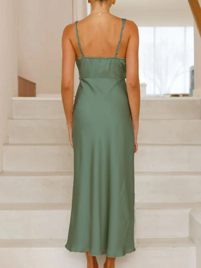 Back view highlighting the design of Satin Asymmetrical Midi Dress in Green