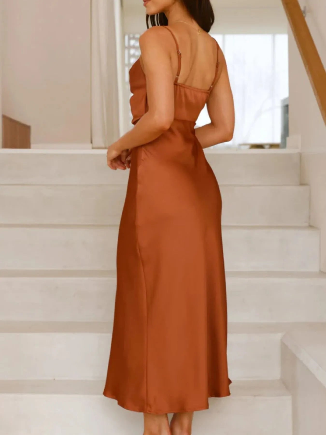 Back view highlighting the design of Satin Asymmetrical Midi Dress in Light Brown