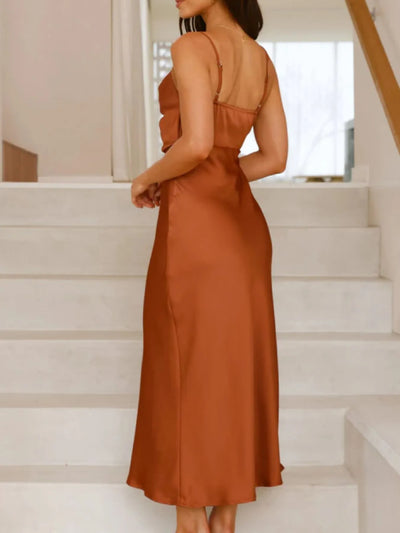 Back view highlighting the design of Satin Asymmetrical Midi Dress in Light Brown