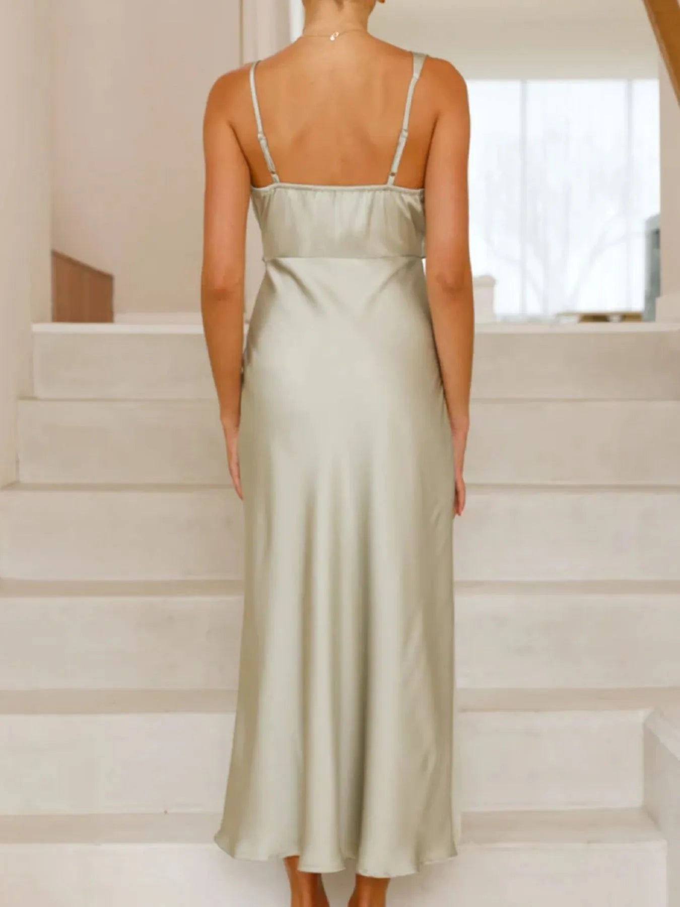 Close-up of fabric texture on Satin Asymmetrical Midi Dress in Light Green