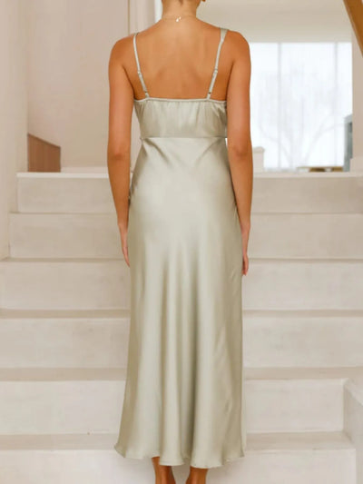 Close-up of fabric texture on Satin Asymmetrical Midi Dress in Light Green