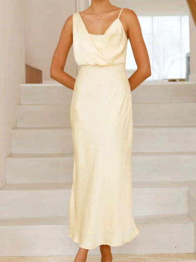 Back view highlighting the design of Satin Asymmetrical Midi Dress in Light Yellow