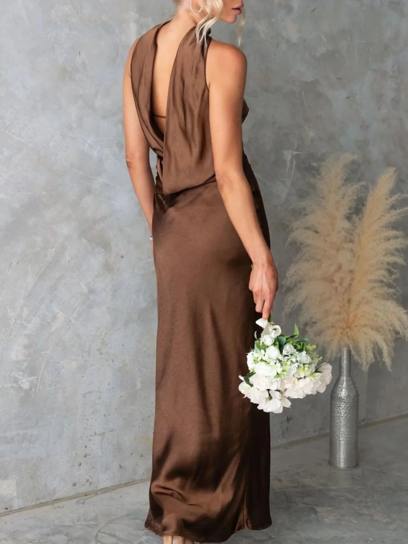 Detail shot of the strapless neckline of Satin Tube Maxi Dress in Brown
