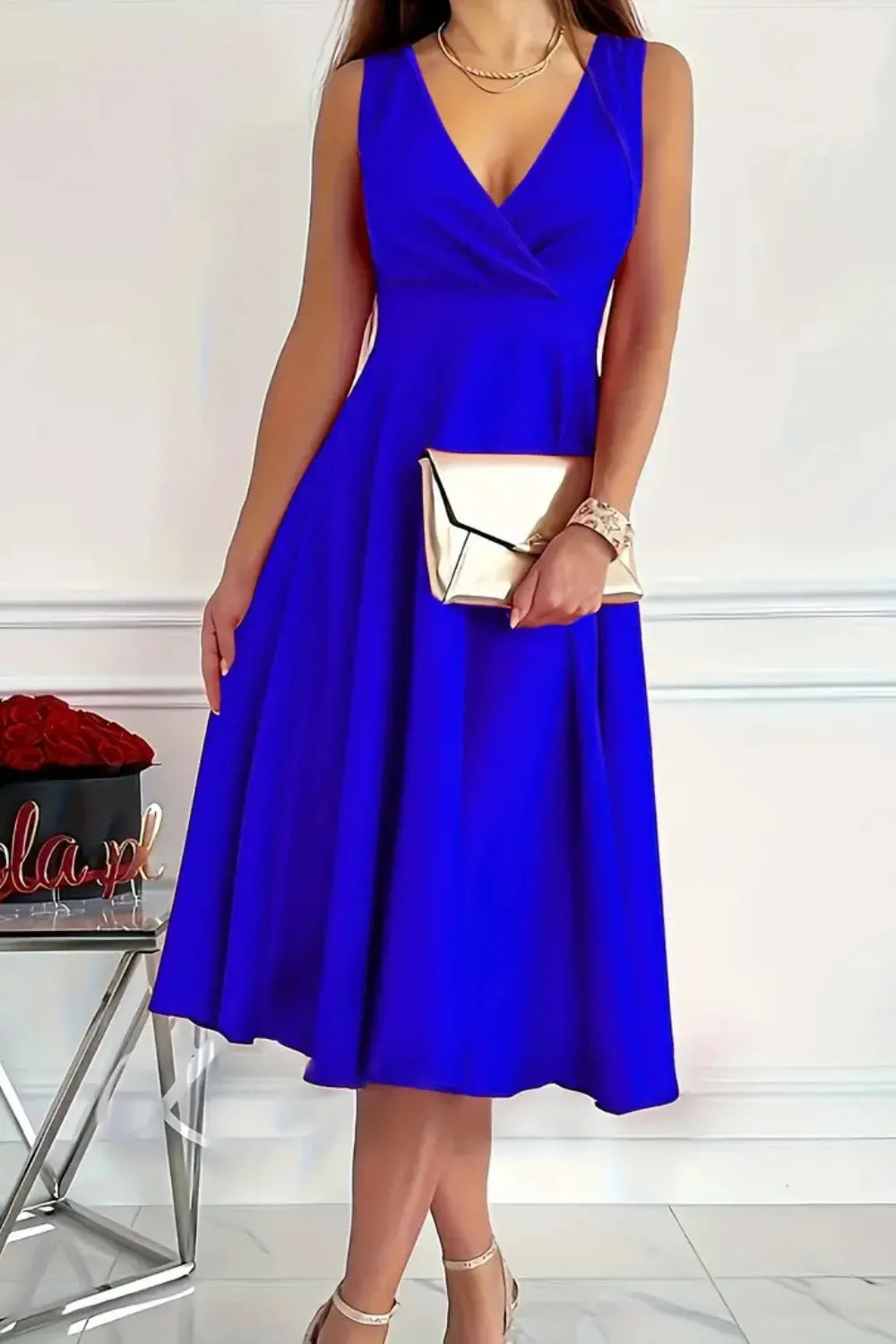 Side view showcasing the fit of Sleeveless Midi Dress in Royal Blue