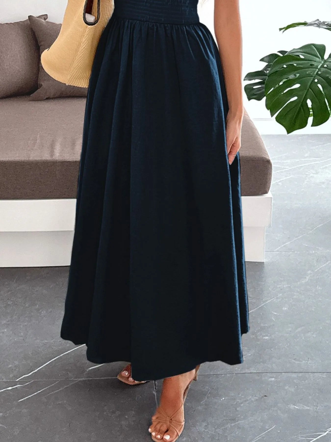 Back view highlighting the design of Smocked Tube Maxi Dress in Black