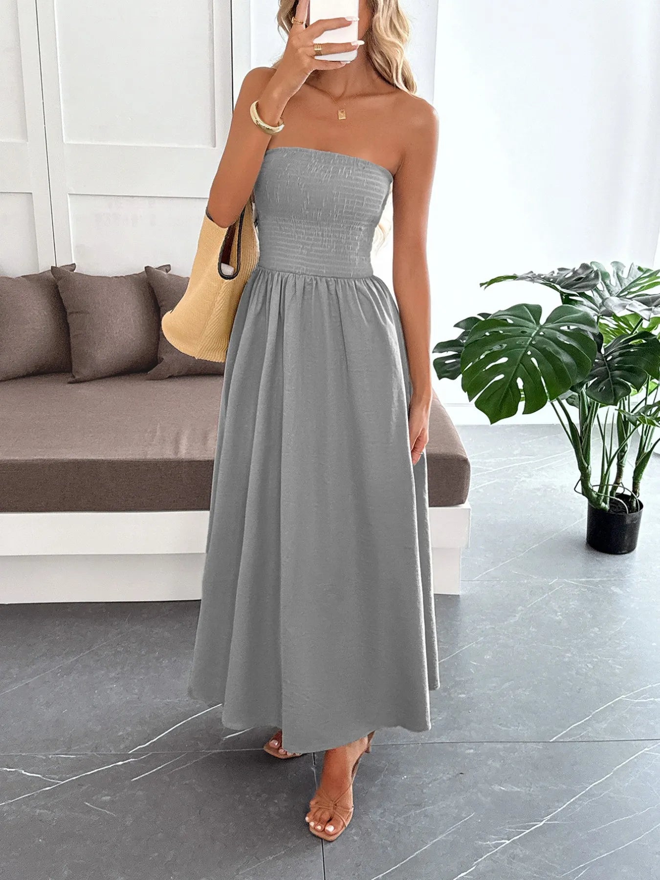 Side view showcasing the fit of Smocked Tube Maxi Dress in Light Gray