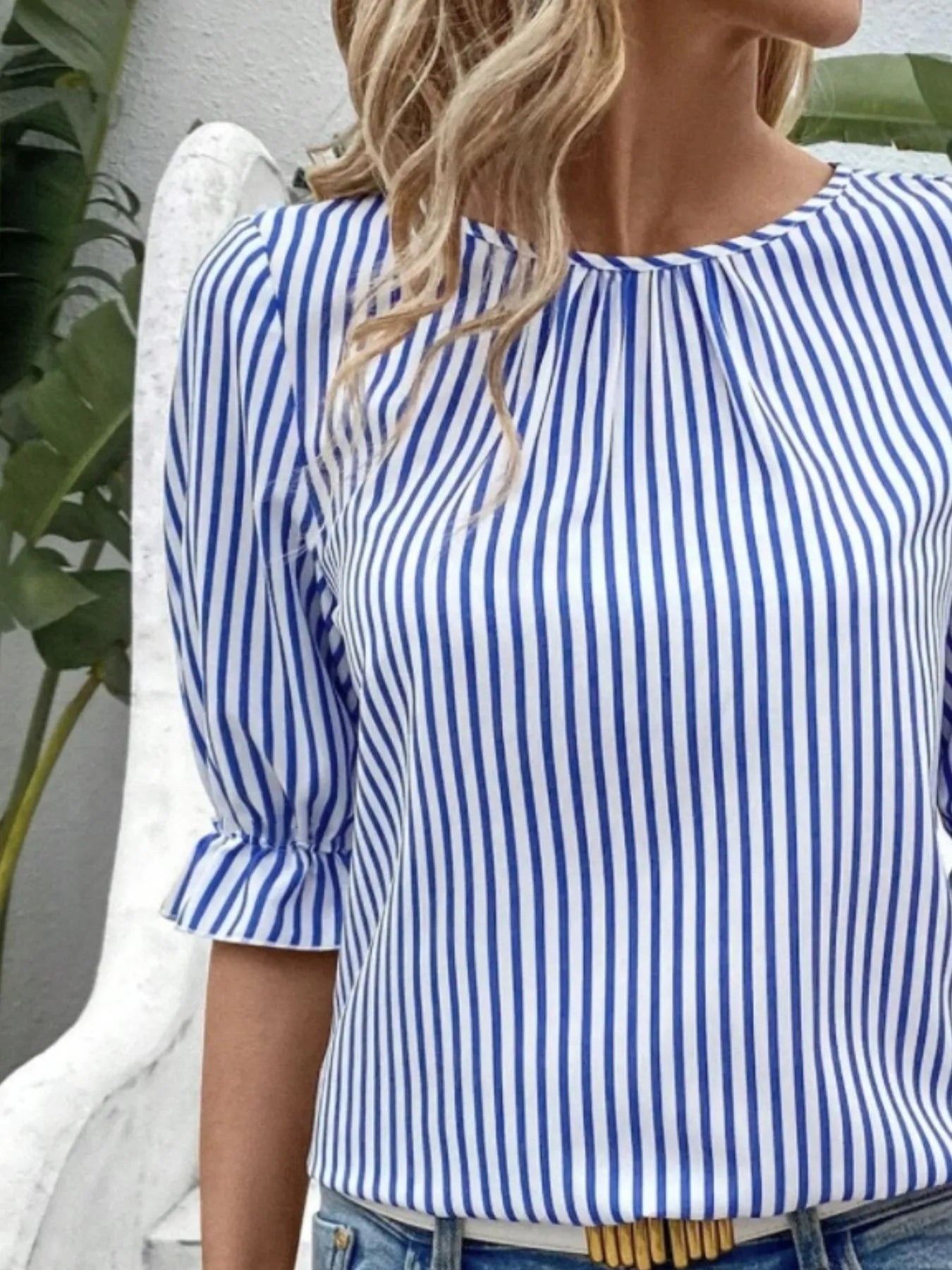 Side view showcasing the fit of Striped Round Neck Half Sleeve Casual Blouse in Blue