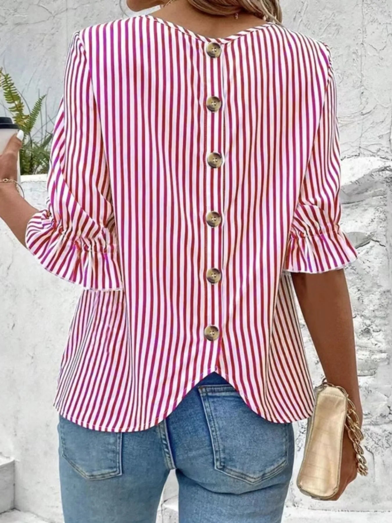 Back view highlighting the design of Striped Round Neck Half Sleeve Casual Blouse in Red