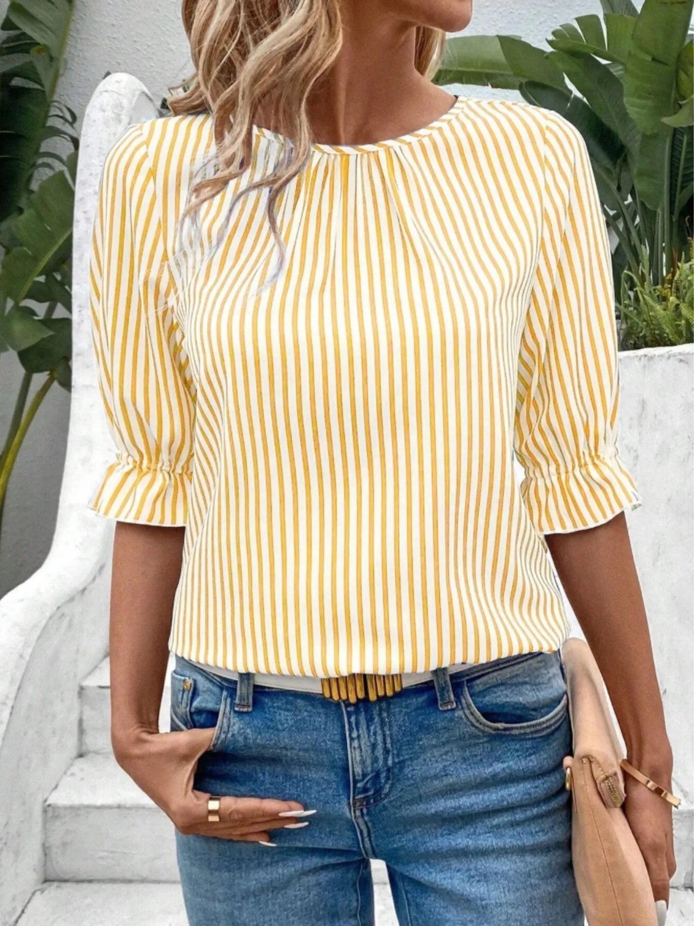 Side view showcasing the fit of Striped Round Neck Half Sleeve Casual Blouse in Yellow