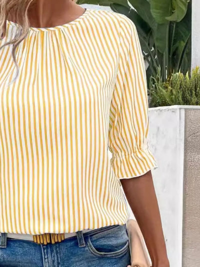 Back view highlighting the design of Striped Round Neck Half Sleeve Casual Blouse in Yellow