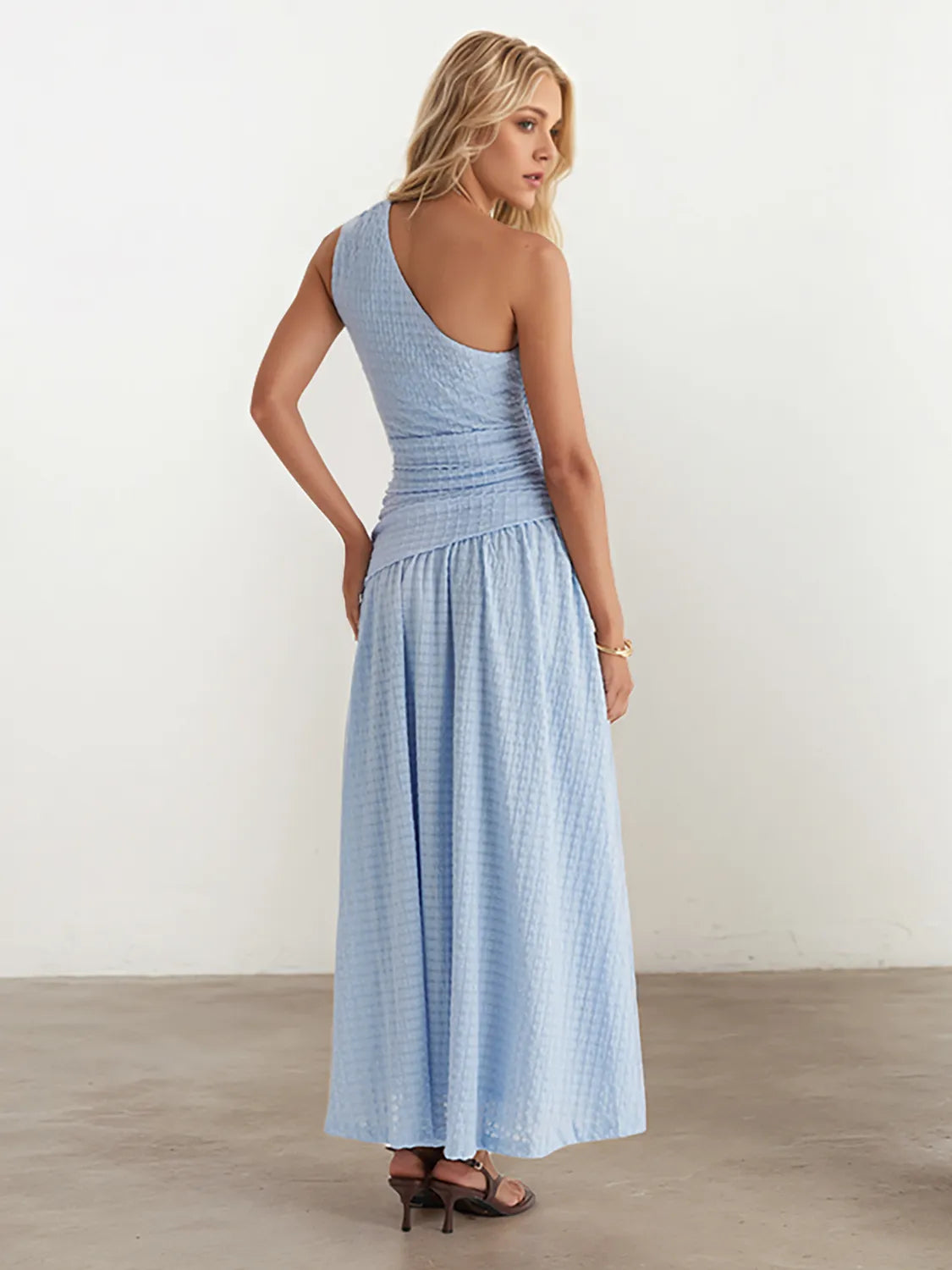 Side view showcasing the fit of Textured Single Shoulder Dress in Light Blue