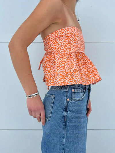 Side view showcasing the fit of Tie Back Tube Top in Orange