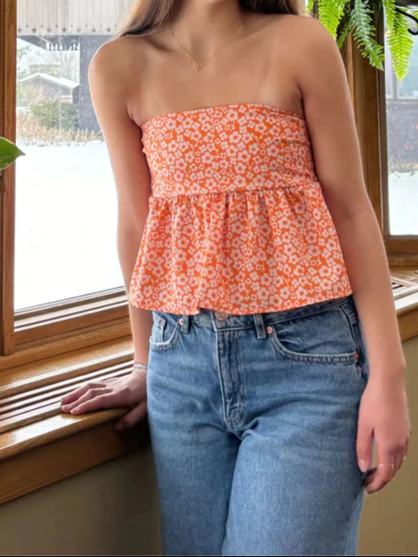Close-up of fabric texture on Tie Back Tube Top in Orange