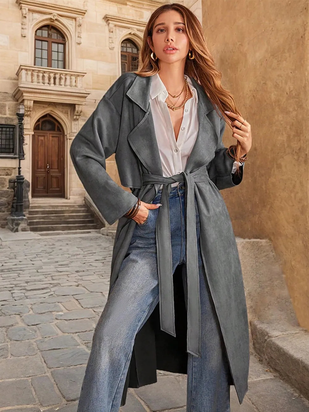 Model wearing Tie Waist Long Sleeve Coat in Dark Gray
